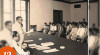 Foto Roeslan Abdulgani menyampaikan sambutan pada Upacara Serah Terima Jabatan Menteri Luar Negeri di aula Kementerian Luar Negeri RI. Tampak Menteri Luar Negeri yang baru, Soebandrio (di sebelah Roeslan Abdulgani), 12 April 1957.